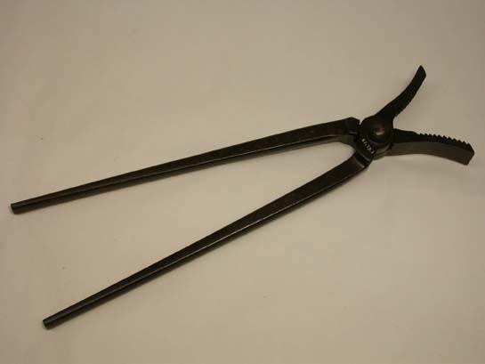a%20pair%20of%20tongs%20with%20serrated%20tong%20ends